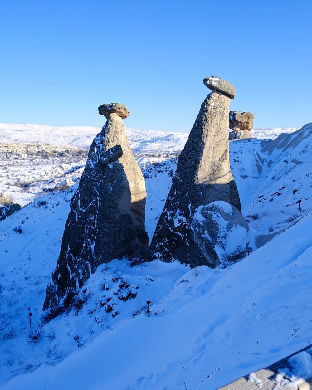 Snow-covered fairy chimneys in Cappadocia in winter