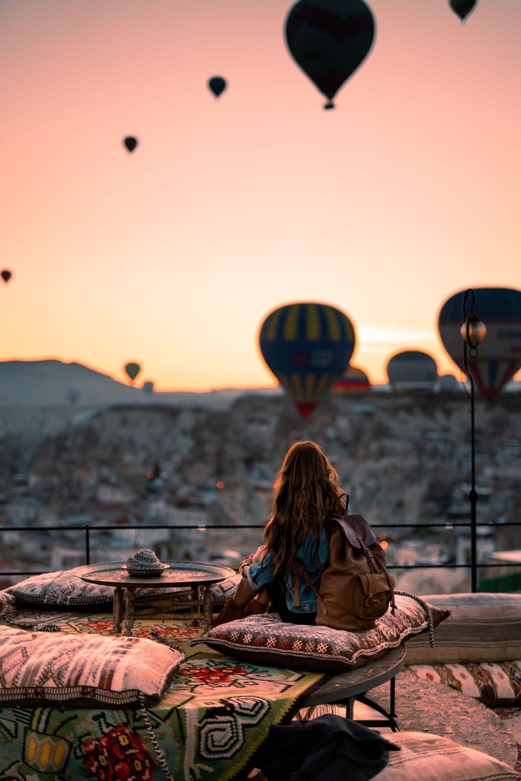 Cave hotel terrace with balloons over Göreme, part of the 2-day tour from Istanbul