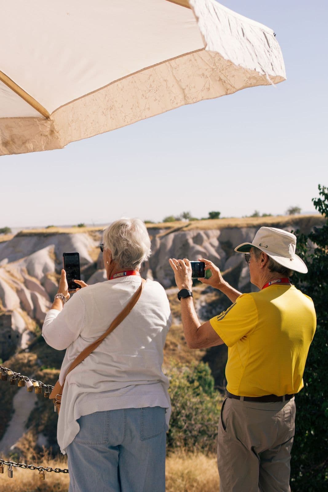 A guide showing two guests the rock formations on a private Cappadocia tour
